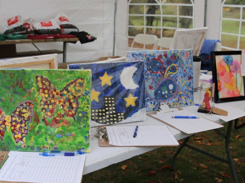 Colourful community artwork displayed at the Art In Motion race