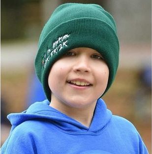 Bruce, a child living with juvenile arthritis, supports the Art In Motion 10K, 5K and 2K charity race benefiting SickKids Foundation.