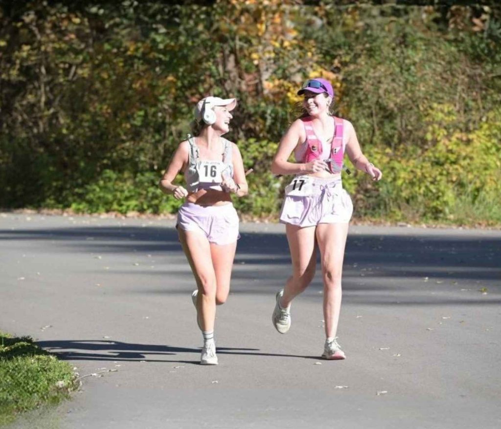 Two women running the Art In Motion 10K race in Vaughan, Ontario